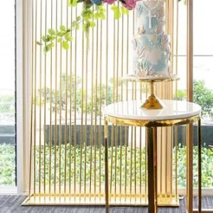 Gold fence back drop